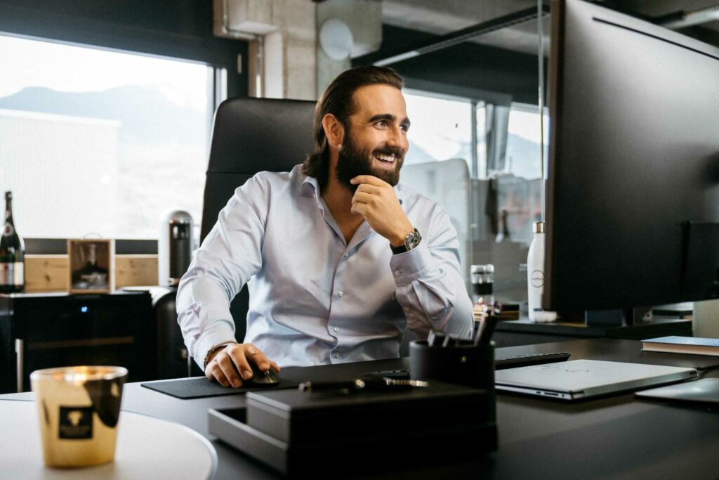 Alexandre Bonvin, Founder and CEO of Audacia Group, is working in his office.